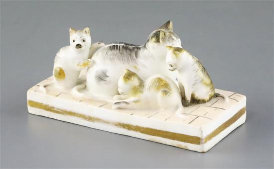 A rare Rockingham group of a cat and three kittens, c.1830, L. 11cm